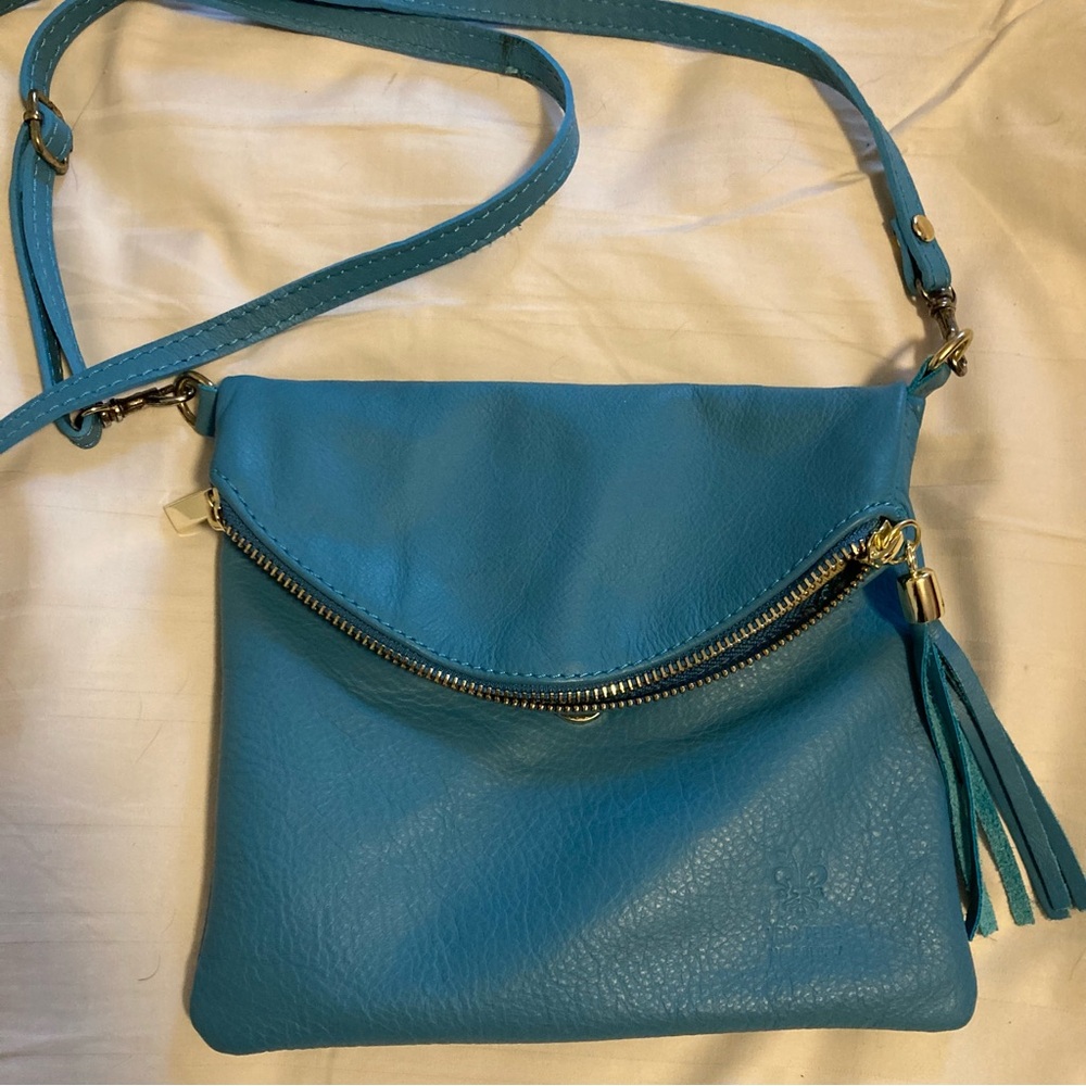 5x8” genuine Italian soft leather turquoise teal crossbody purse with pockets.